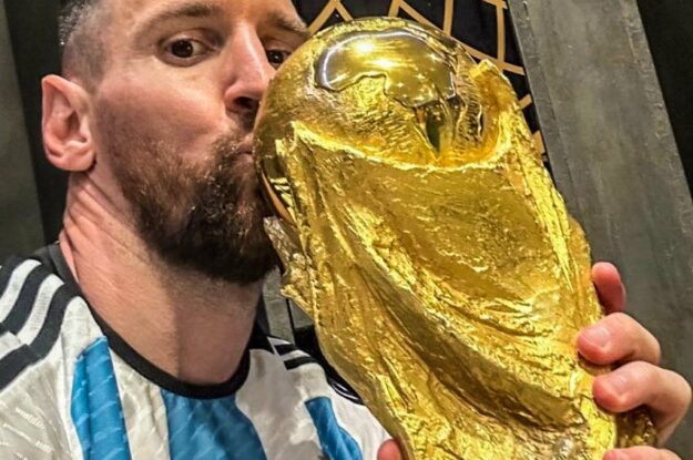 Messi takes historic selfie with the World Cup Trophy