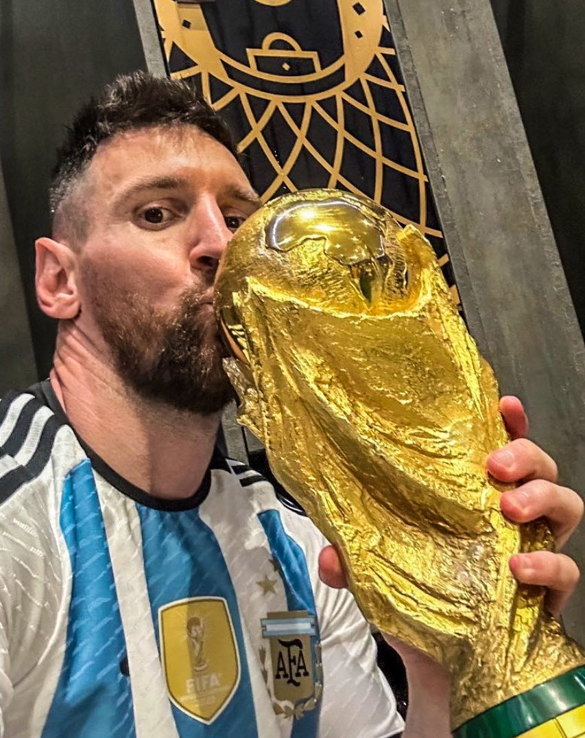 Messi takes historic selfie with the World Cup Trophy